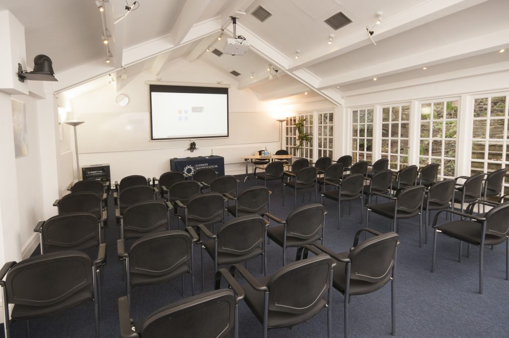 Photo of a large meeting room in a theatre style