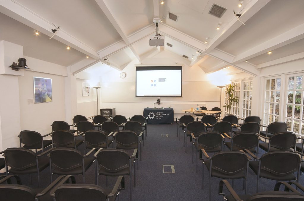 Photo of a large meeting room in a theatre style