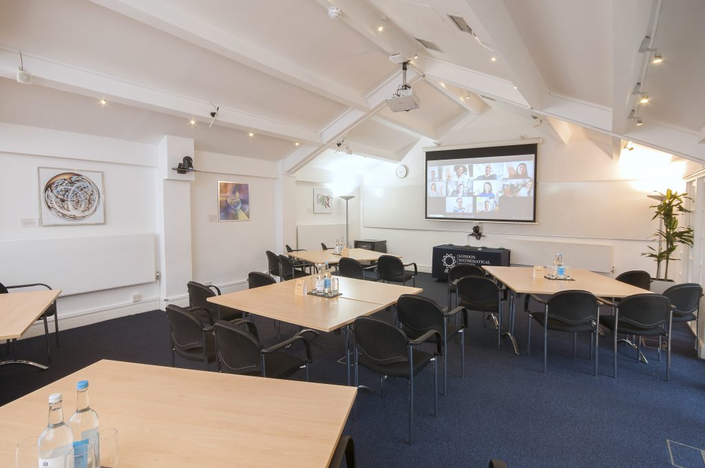 Photo of a large meeting room in a cabaret style