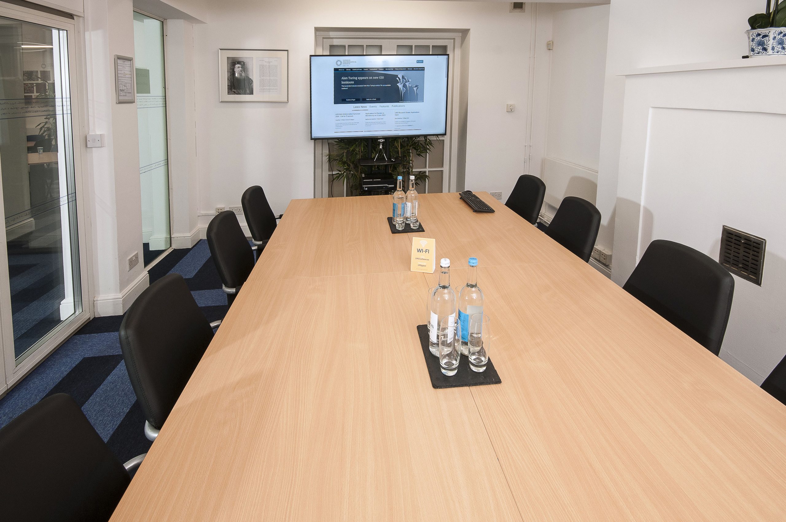 Photo of a small sized meeting room in a boardroom style