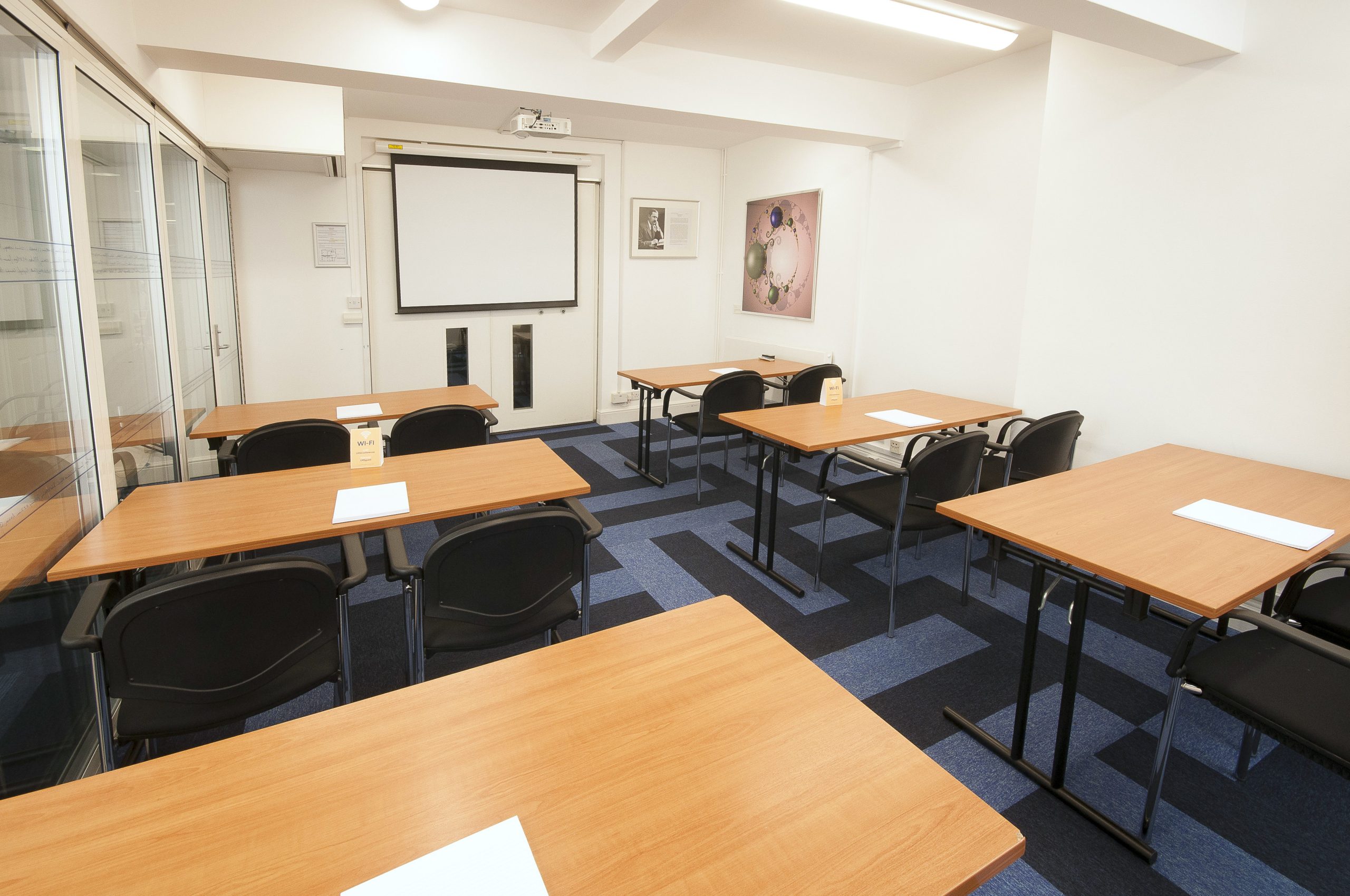 Photo of a medium sized meeting room in a classroom style